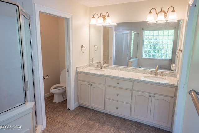 3522 Fox Run Blvd, Panama City, FL 32408 - full bath with double vanity, toilet, a stall shower, and a sink
