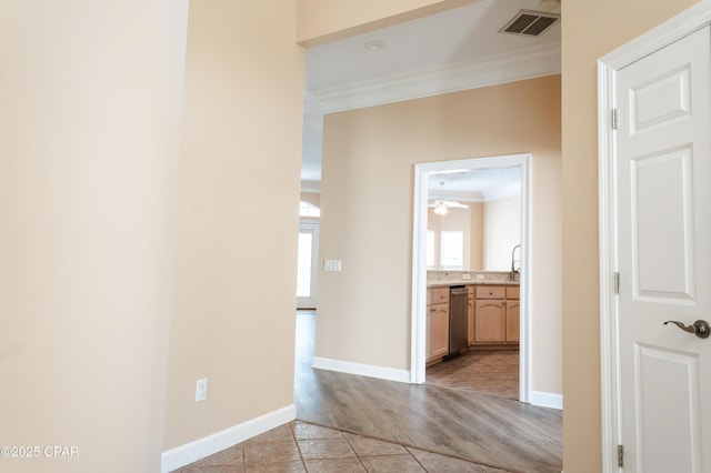 3522 Fox Run Blvd, Panama City, FL 32408 - corridor with baseboards, visible vents, ornamental molding, and light tile patterned flooring