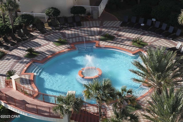 view of swimming pool with a patio area