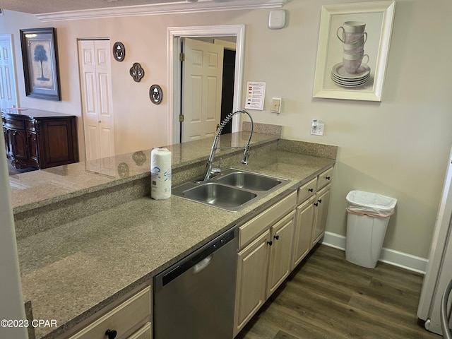 kitchen with ornamental molding, a textured ceiling, sink, dishwasher, and dark hardwood / wood-style floors