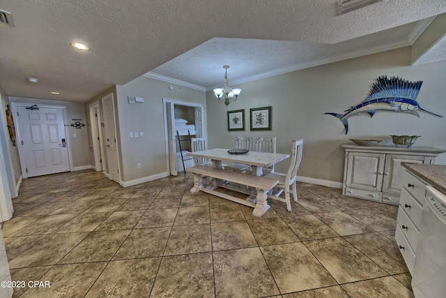 dining area featuring tile patterned floors, a textured ceiling, an inviting chandelier, and ornamental molding