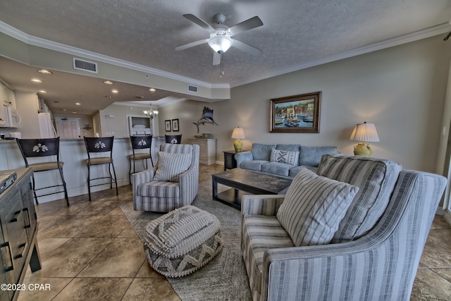 tiled living room with crown molding and a textured ceiling