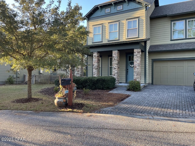 view of front of property featuring a garage