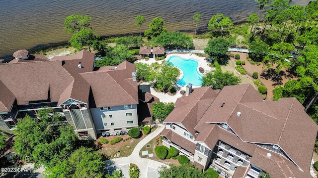 drone / aerial view with a water view