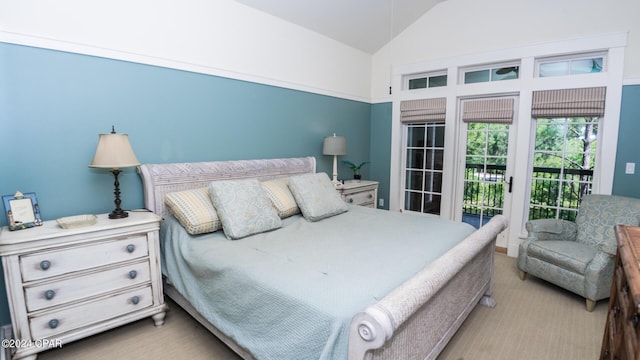bedroom with lofted ceiling, carpet flooring, and access to outside