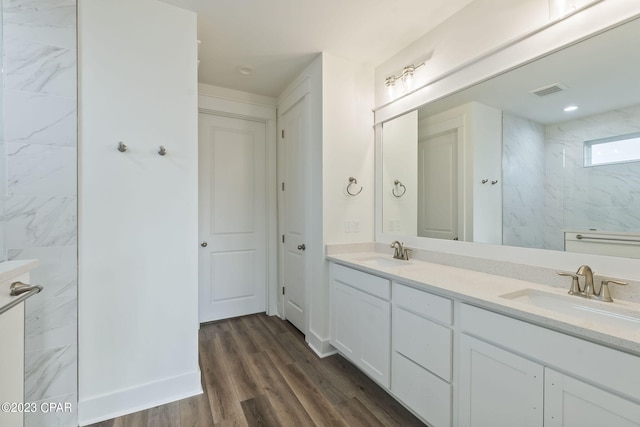 bathroom featuring vanity and wood-type flooring