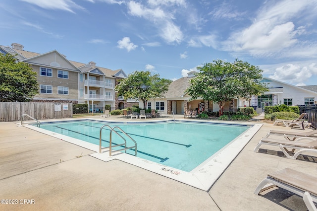 view of swimming pool featuring a patio