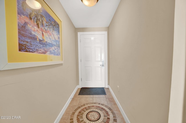 entryway featuring light tile patterned floors