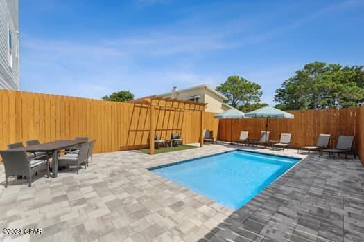 view of pool featuring a patio area