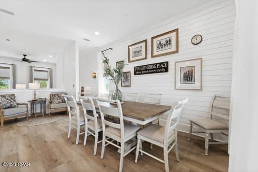 dining room featuring hardwood / wood-style floors and ceiling fan