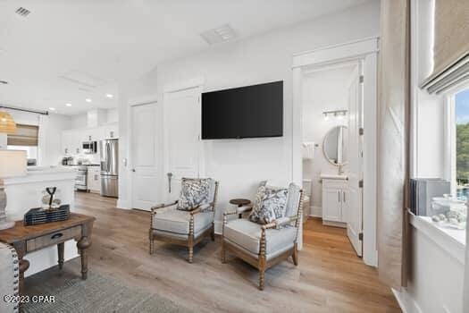 living area with light wood-type flooring