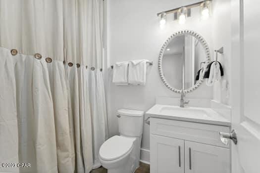 bathroom with vanity and toilet