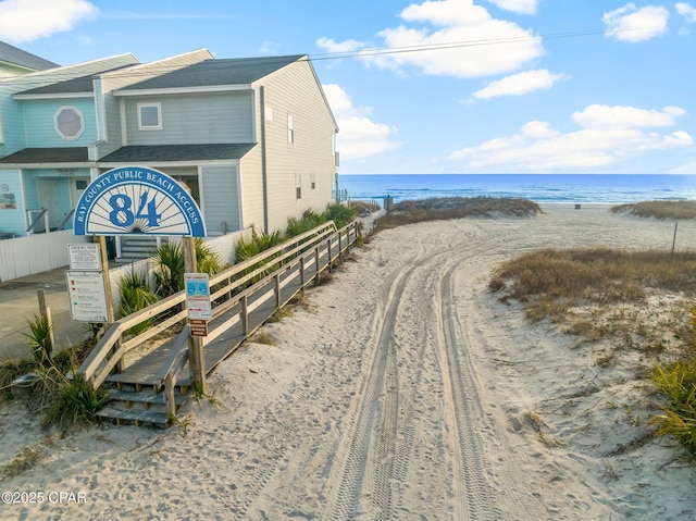 exterior space featuring a beach view