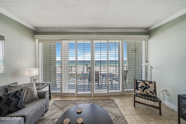 living room featuring a textured ceiling, crown molding, and a water view