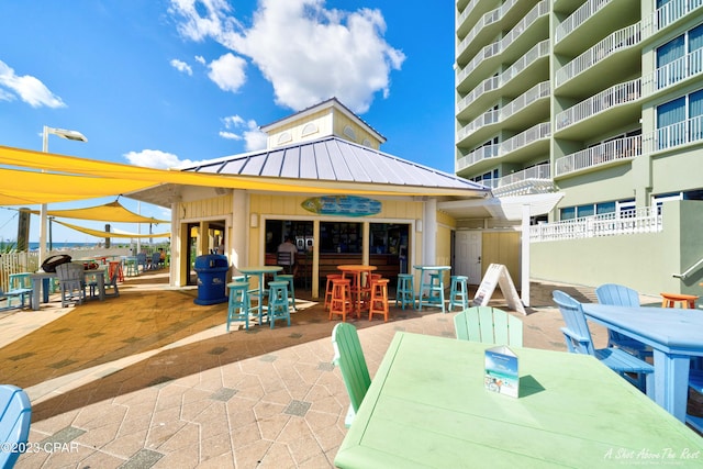 view of patio with a balcony