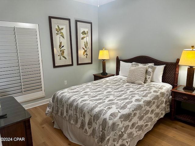 bedroom with light hardwood / wood-style flooring