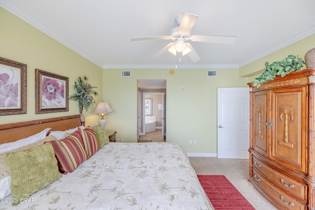 bedroom with ornamental molding, light carpet, ceiling fan, and ensuite bathroom