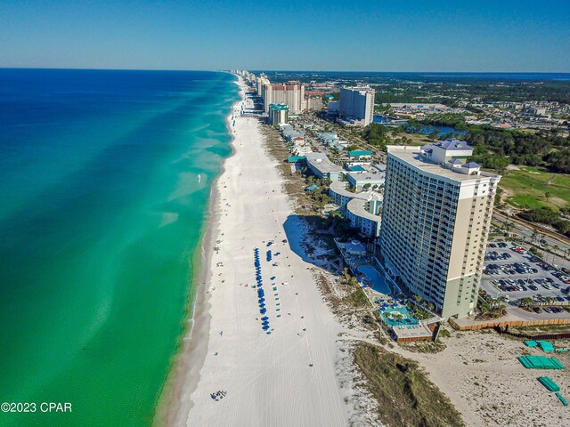 drone / aerial view with a view of the beach and a water view