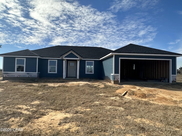 view of front of property with a garage