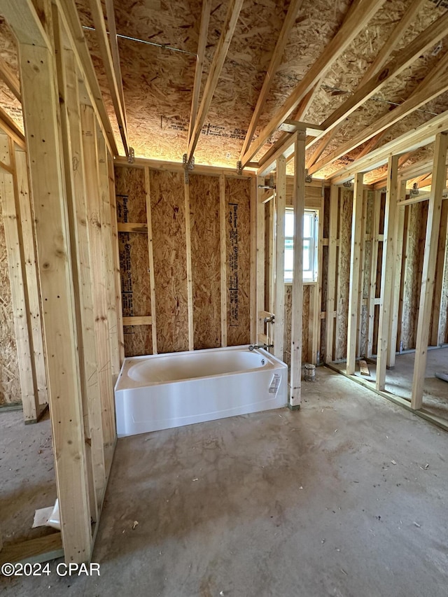 bathroom with a washtub