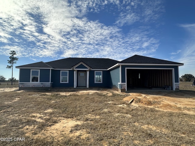 view of front of house with a garage