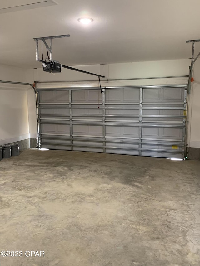 garage featuring a garage door opener