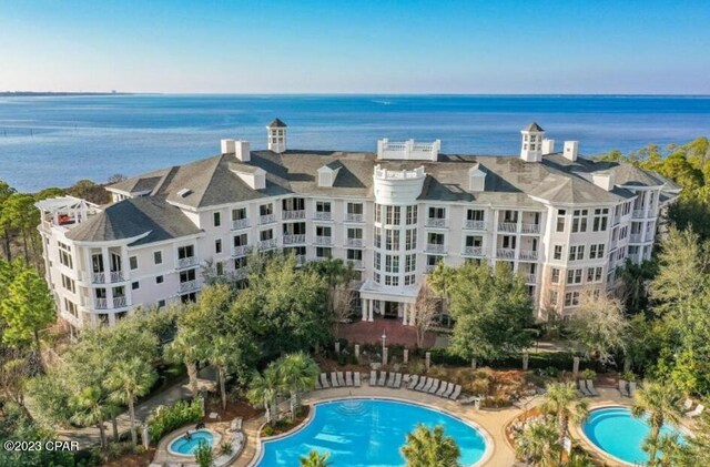 exterior space featuring a patio and a water view