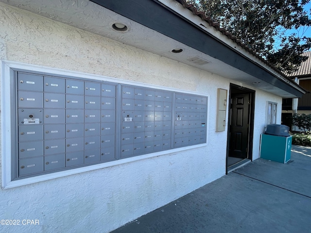 view of home's community with mail boxes