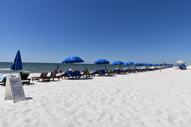 property view of water featuring a view of the beach