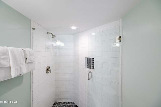 bathroom with an enclosed shower