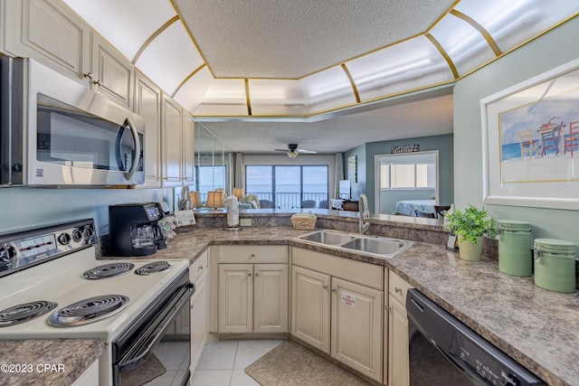 kitchen with electric stove, ceiling fan, sink, dishwasher, and a textured ceiling