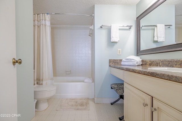 full bathroom with toilet, tile floors, shower / bathtub combination with curtain, and vanity with extensive cabinet space