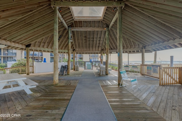 exterior space featuring a deck and a gazebo