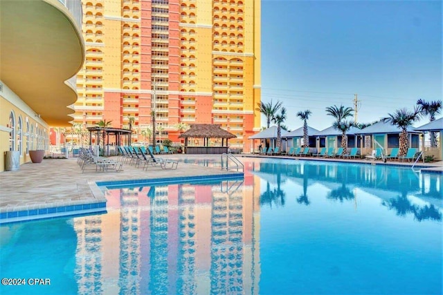 view of swimming pool featuring a patio