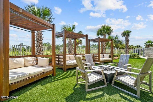 exterior space featuring a pergola and an outdoor living space with a fire pit