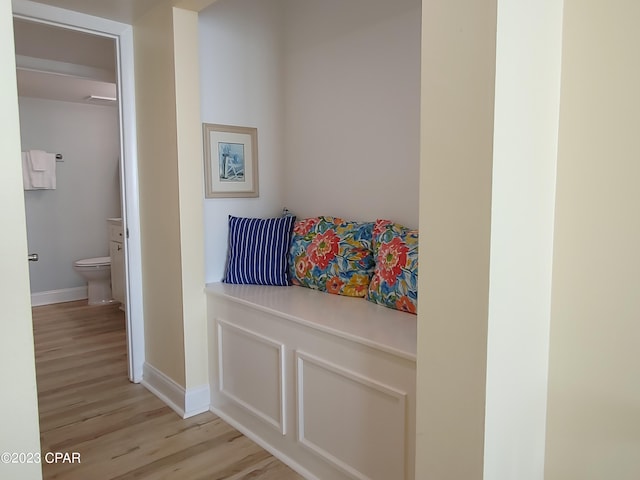 mudroom with light wood-type flooring and baseboards