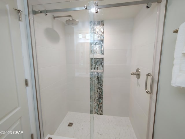 bathroom featuring a stall shower