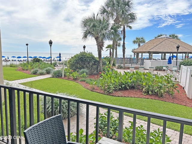 balcony featuring a water view