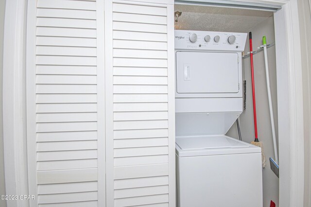 kitchen with ornamental molding, stainless steel appliances, sink, and white cabinets