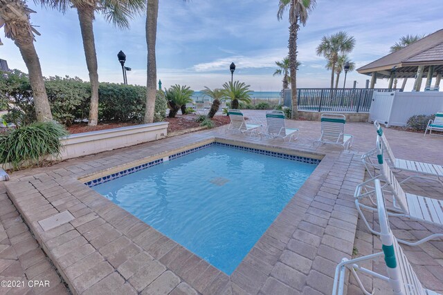 view of pool featuring a gazebo and a patio area