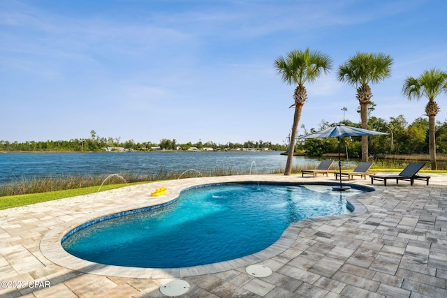 view of pool featuring pool water feature and a patio