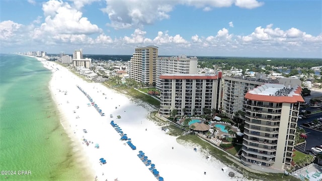 bird's eye view with a view of the beach and a water view