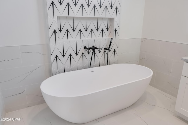 bathroom with tile walls and tile floors