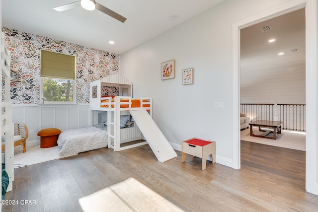 bedroom featuring wood-type flooring and ceiling fan