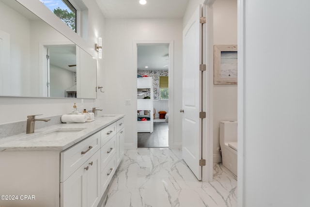 bathroom with tile floors and double vanity