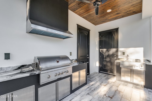 view of terrace with sink, ceiling fan, and area for grilling