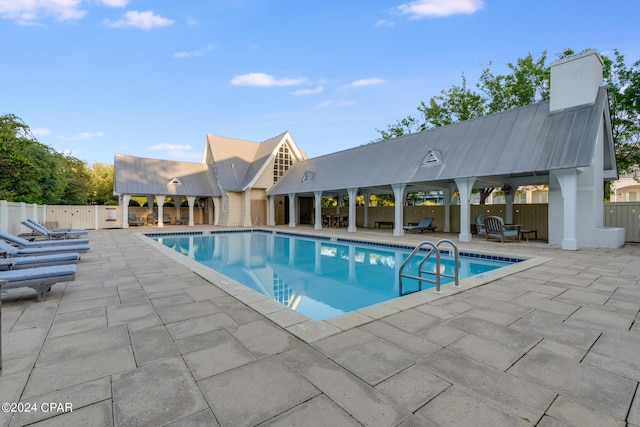 view of pool featuring a patio area