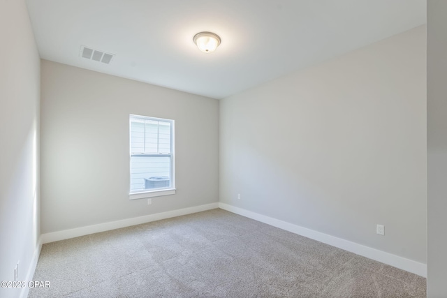 unfurnished room featuring carpet floors