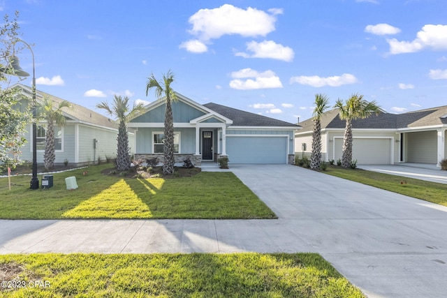 view of front facade featuring a garage and a front yard