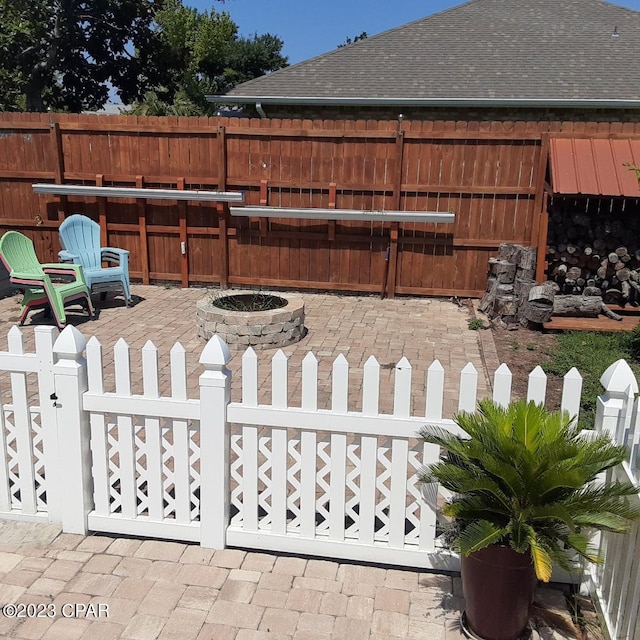 exterior space with an outdoor fire pit